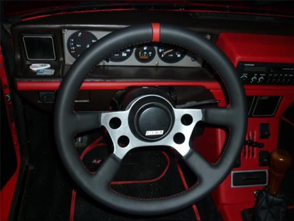 Picture of steering wheel, original, covered in LEATHER or ALCANTARA