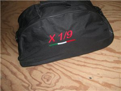 Picture of bag with embroidered X 1/9 emblem, black