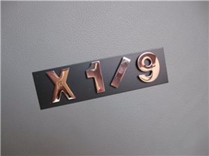 Picture of X 1/9 emblem, magnet letters