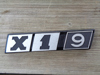 Afbeeldingen van X 1.9 embleem 1300, bagagedeksel