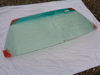 Picture of windshield green tinted with sun shide band