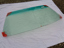 Picture of windshield green tinted with sun shide band